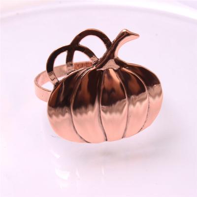 China Craftsman Wholesale Christmas Easter Gold Stainless Steel Pumpkin Decorative Pink Napkin Rings for sale