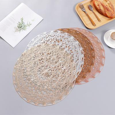 China Sustainable European Natural Cute Dining Table Hallow Rugs To Marry Round Gold Vinyl PVC Pink Place Mats for sale