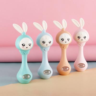 China Baby Soft Music Teether Flashing Rattle Toys Rabbit Hand Bells Mobile Infant Pacifier Cry Tear Newborn Early Educational Toys for sale