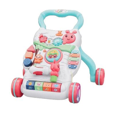 China Baby Walking Learning Game Board Baby Early Educational Toys 4 in 1 Multifunctional Handheld Push Game Board Walker Baby with Light and Music for sale