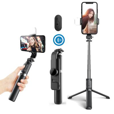 China Hot Selling 360 Degree Rotation Extend 1045mm Q02S With 3 in1 360 Rotation Warm Cold Fill Light LED Tripod Selfie Stick Selfie Stick for sale