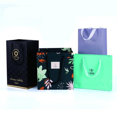 China Custom Paper Cardboard Shopping Bags With Your Own Logo Offset Printing for sale