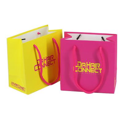 China OEM Kraft Shopping Paper Bags For Clothing And Shoes Gift Handbags for sale