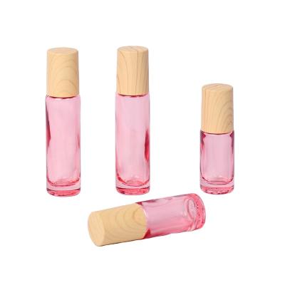 China Personal Care Retail Cosmetic Frosted Purple Glass Roll On Glass Bottle 5ml 10ml Essential Oil Deodorant Bottle for sale