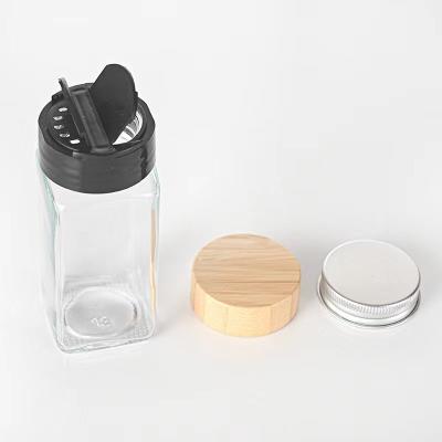 China Food Factory Cheap Glass empty square salt and pepper spice bottles with dual open lid Seasoning jar for sale