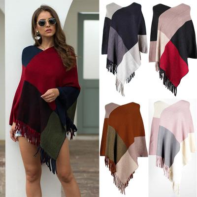 China Other Wholesale Color Block Tassel Shawl Cape Diagonal Geometric V-Neck Sweater Softly Knitted Women's Coat Sweater for sale