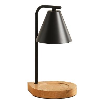 China Small Rustic Minimalist Smokeless Style Temperature Adjustment Wooden Bedside Art Candle Lamp Wax Aromatherapy Night Lamp for sale