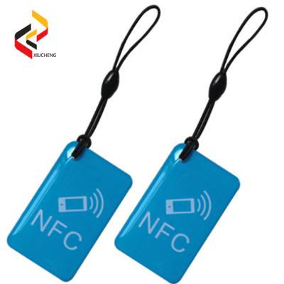 China Custom Printing ABS/PVC/leather/PMMA Etc Tag NFC Qrcode NFC215 RFID Keyfob Variable Epoxy for sale