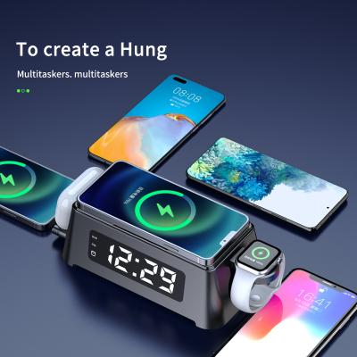 China 2021 Hot Selling Charging Products 15W Phone Fast Charging 4 in 1 Wireless Charger Station with Alarm Clock for sale