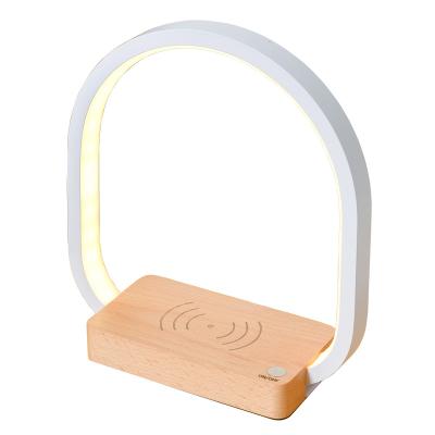 China Amazon USB Mobile Wireless Charging Sensor Charging Wooden LED Mood Desk Light Induction Table Lamp Radio Lamp Wood Smart Detection Light for sale