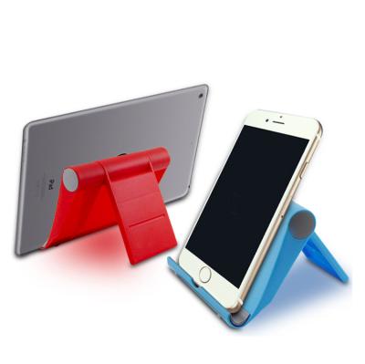 China For ipad logo and phone printing cheap universal plastic tablet stand mobile phone holder for ipad for sale