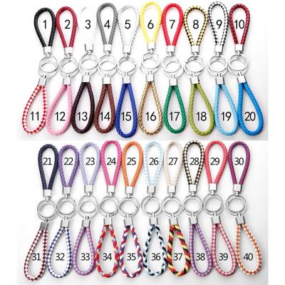 China Wholesale Colorful Woven Key Chains Durable PU Leather Durable Car Accessories Key Chain for sale