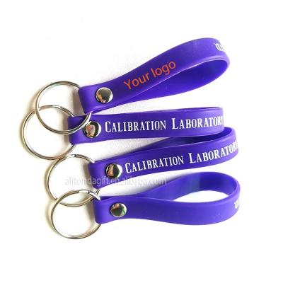 China Sports Wholesale Blank PVC Silicone Key Chain Wristband Personalized Custom Logo Sports Advertising Promotional Gifts Soft Rubber Key Ring for sale