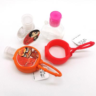 China With keychains hot healthy accessories round shape hand sanitizer holder with silicone lanyard key chain holder for sale