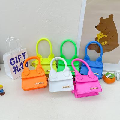 China Mini Coin Purse Bag Portable Simple Color Waterproof Candy PU Leather Kids Shoulder Bags for sale