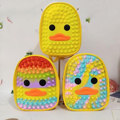 China Adults Children Relaxing Toys Lovely Little Duck Pop Kids School Bag Yellow Silicone Toys Pop Up Busty Person Backpack For Children for sale