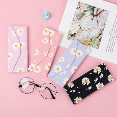 China Portable Lightweight Quality Foldable Triangle Shape Cases With Flowers Logo Customizable Pu Cases For Glasses 2021 for sale