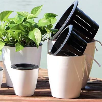 China Modern Round Plant Pot Plastic Self Watering Planter, Cheap Plastic Self Watering Planter With Inner Pot for sale