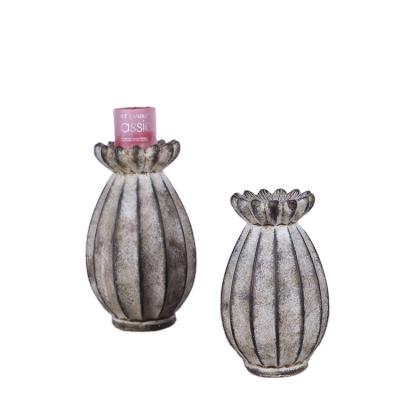 China Bending Pastoral Home Decoration Melon Shape Tall Concrete Candlestick Material Stand for sale