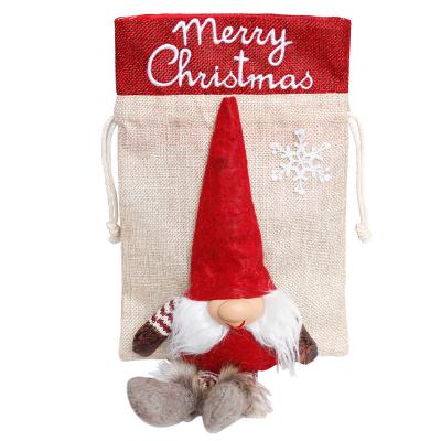 China Santa Doll Cloth Drawstring Storage Bag Christmas Gift Bag Viable Faceless Gift Candy Storage Bag for sale