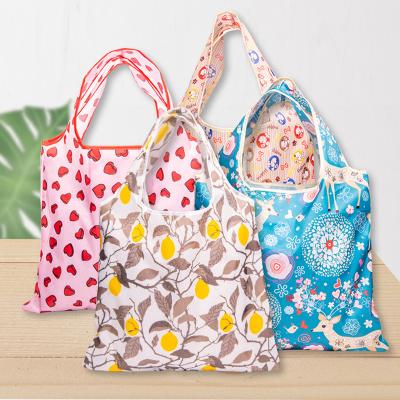 China New large minimalist floral fabric waterproof portable foldable environmental protection shopping bag for sale