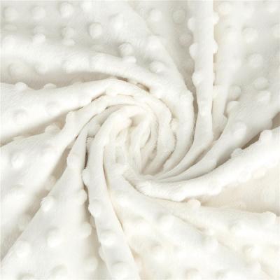 China Soft Embossed Bubble Minky Dot Plush Blanket Fabric Breathable Baby Cuddle Blanket Fabric Poly Dot Embossed Fabric for sale