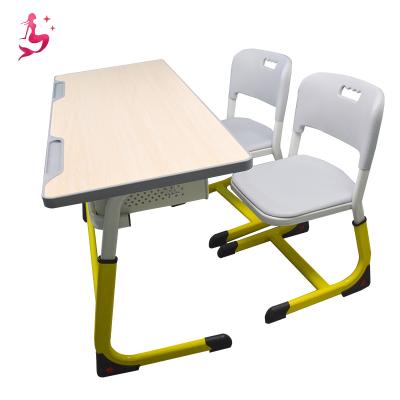 China Comfortable school training desks and chairs solid, stable, space-saving, multi-functional for sale