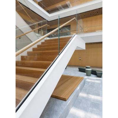 China China Manufacturer Direct Modern Design Large Modern Mall Staircase Enclosed Pedal Steel Structure Solid Wood Staircase for sale