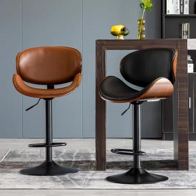 China Modern Leather Swivel Height Wood Stools Adjustable Bar Chair Luxury For Commercial Use In Black And Gold Color for sale