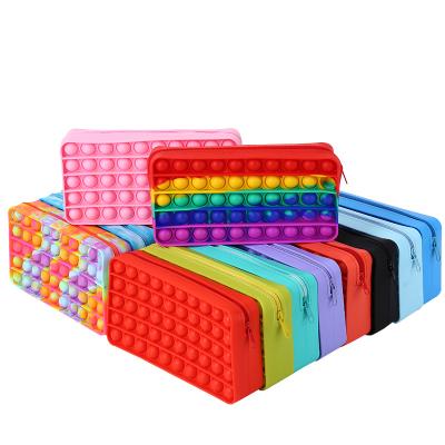 China Schools & Offices Pen Storage Bag Push Bubble Pencil Bags School Kids Rainbow Silicone Busy Pencil Case for sale