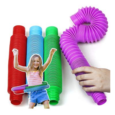 China Relieve Plastic Tubes Toy Fidgets Pipe Autism Sensory Stress Reliever Stretchy Person Adult Colorful Tubes for sale