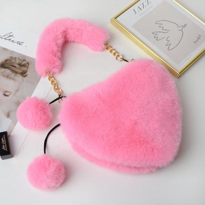 China 2021pink high quality faux fur bags ladies heart shaped purses fashion plush handbags for women chain purse for sale