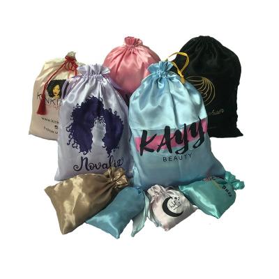 China Custom Water Wave logo Christmas gift wig storage and packing pouch drawstring satin silk silk bags for hair bundles for sale