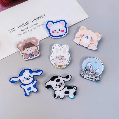 China Cute Cartoon Garment Hot Sale Custom Designer Fashion Accessories Transparent Acrylic Badge Pin Badges for sale