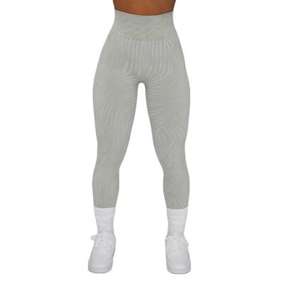 China Breathable 4 pcs set Zebra Pattern Seamless Yoga set Sports Hip Lift Pants butt lifting Scrunch legging for sale