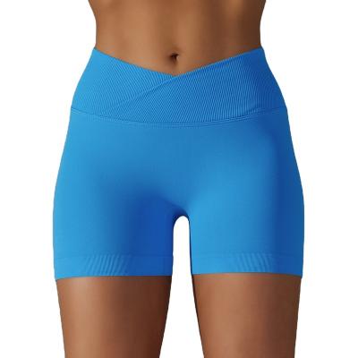 China Breathable Seamless Knitted Breathable Solid Color Cross Waist Peach Hip Yoga Shorts Running Fitness V cut short for Women for sale