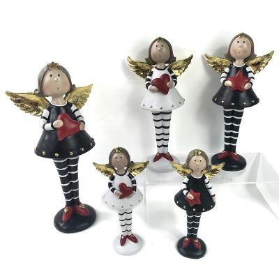 China Europe Wholesale Navidad Open Poly Christmas Resin Angel Angel Girl Figurine Christmas Ornament Resin Statue Beautiful for sale