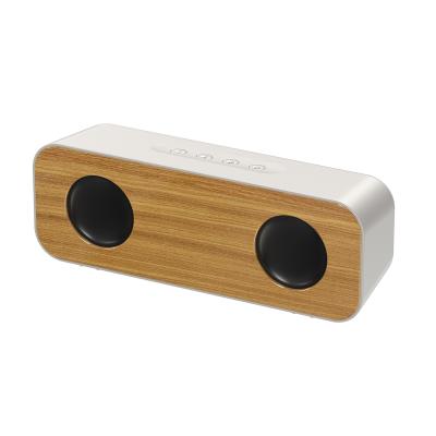 China Wireless Customize Promotional Gift Wooden Speaker Bamboo Mini Wireless Speaker Environmental Protection for sale