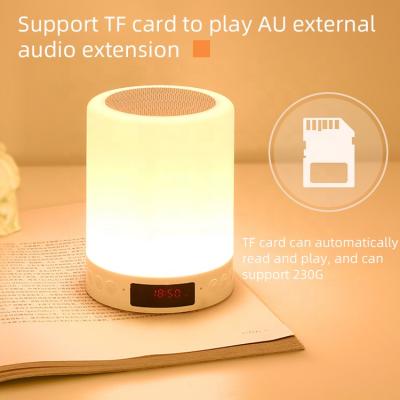 China Hot Selling Portable Blue LED Colorful Light Touch Light Lamp Tooth Hanging Speaker with Alarm Clock for sale