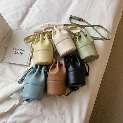 China 100% Eco-Friendly Luxury PU Bucket Bag Eco-friendly Design Brand Ladies Single Shoulder Drawstring Solid Color Solid Color Messenger Bags for sale