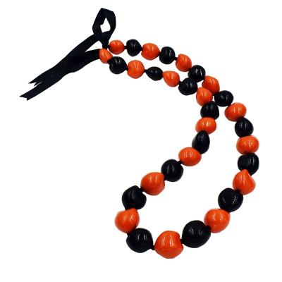 China Customized Casual/Sporting NFL Black/Orange Hawaiian Kukui Nut Lei Necklace Made With Real Kukui Nut Beads Necklace For Men And Women for sale