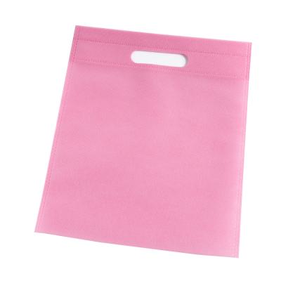 China Reusable promotional recyclable cheap custom logo D cut non woven packaging vest shopping bags in stock for sale