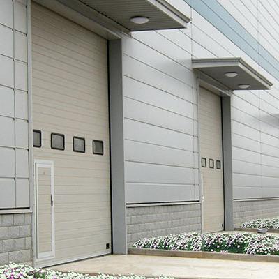 China Modern high quality polyurethane foam insulated sectional industrial doors and insulated sectional garage doors for sale