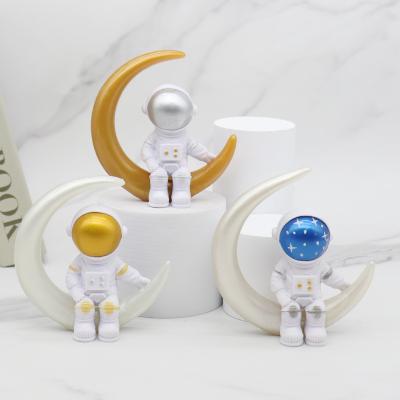 China Fast Delivery Wholesale 3 Colors Cheap Sitting On The Moon Space Astronaut Toy Figure PVC Custom Toy For Ornaments for sale