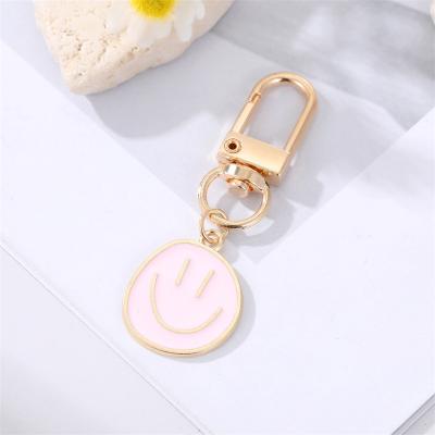 China Wholesale Bulk Metal Enamel Metal Keychain Accessories For Women Happy Girls Smiley Face Keychain for sale