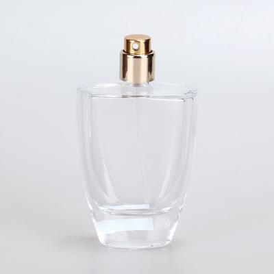 China Unique Clear Bulk Spray Bottle Wholesale Empty Luxury 50ml Personal Care Oil Glass Refillable Perfume Bottles for sale