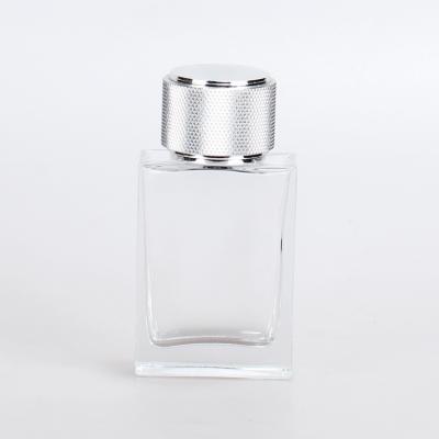 China Personal Care Custom 2021 Glass Cosmetic Clear Perfume Bottle 50ml Perfume Bottle With Glossy ABS Cap for sale