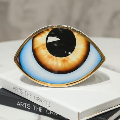 China Contemporary gold eye ceramic decoration for home accessories ornament living room home decor table modern luxury decoration for sale