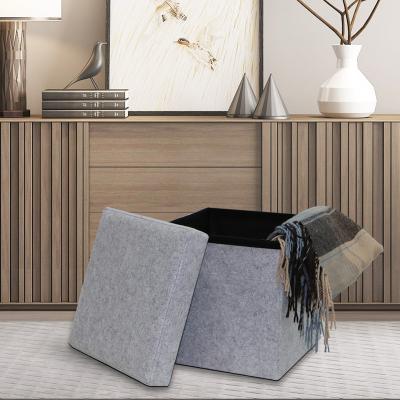 China Reatai 2020new style foldable upholstered storage blue folding stool in fabric foldable velvet box cube stool for sale