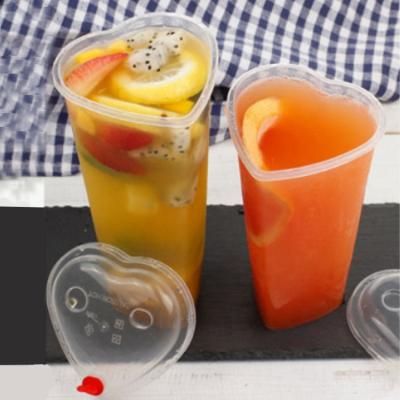 China Eco - Friendly Heart Shape Bubble Tea Cups Disposable Milky Tea 500ml Injection Juice Cups With Lids for sale